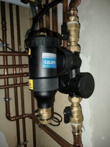 pot à boue sur le circuit de chauffage